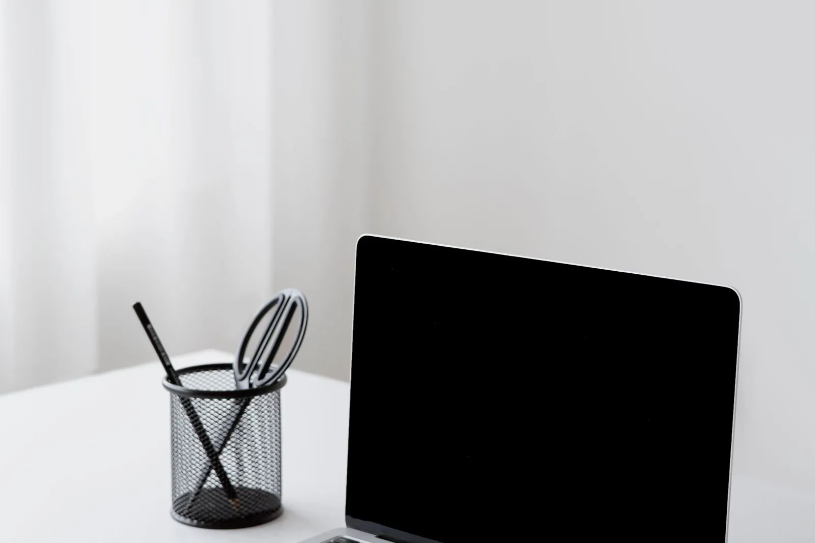 Reading USDA lender reviews the right way Laptop on a clean white desk, set up to read USDA lender reviews and compare Loan Estimates