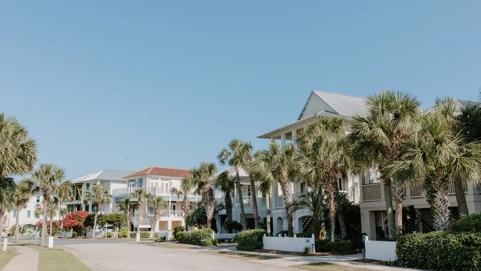 DSCR loan example for a Florida rental Palm lined residential street with two story homes in Florida, illustrating a DSCR loan on a rental property