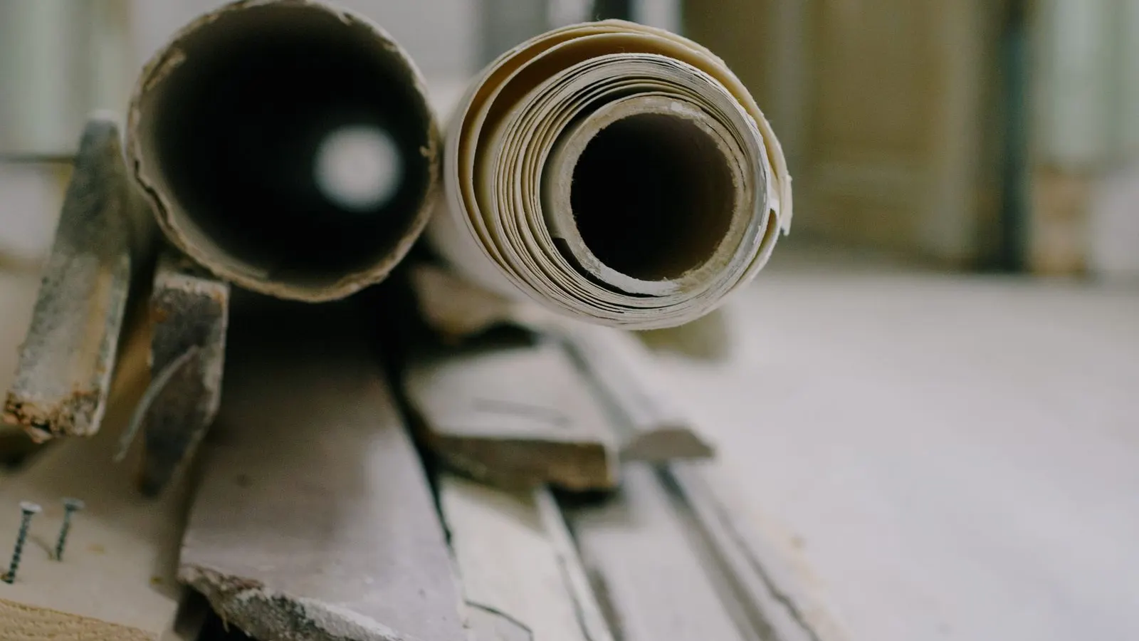 Rolls of building materials inside a house mid renovation