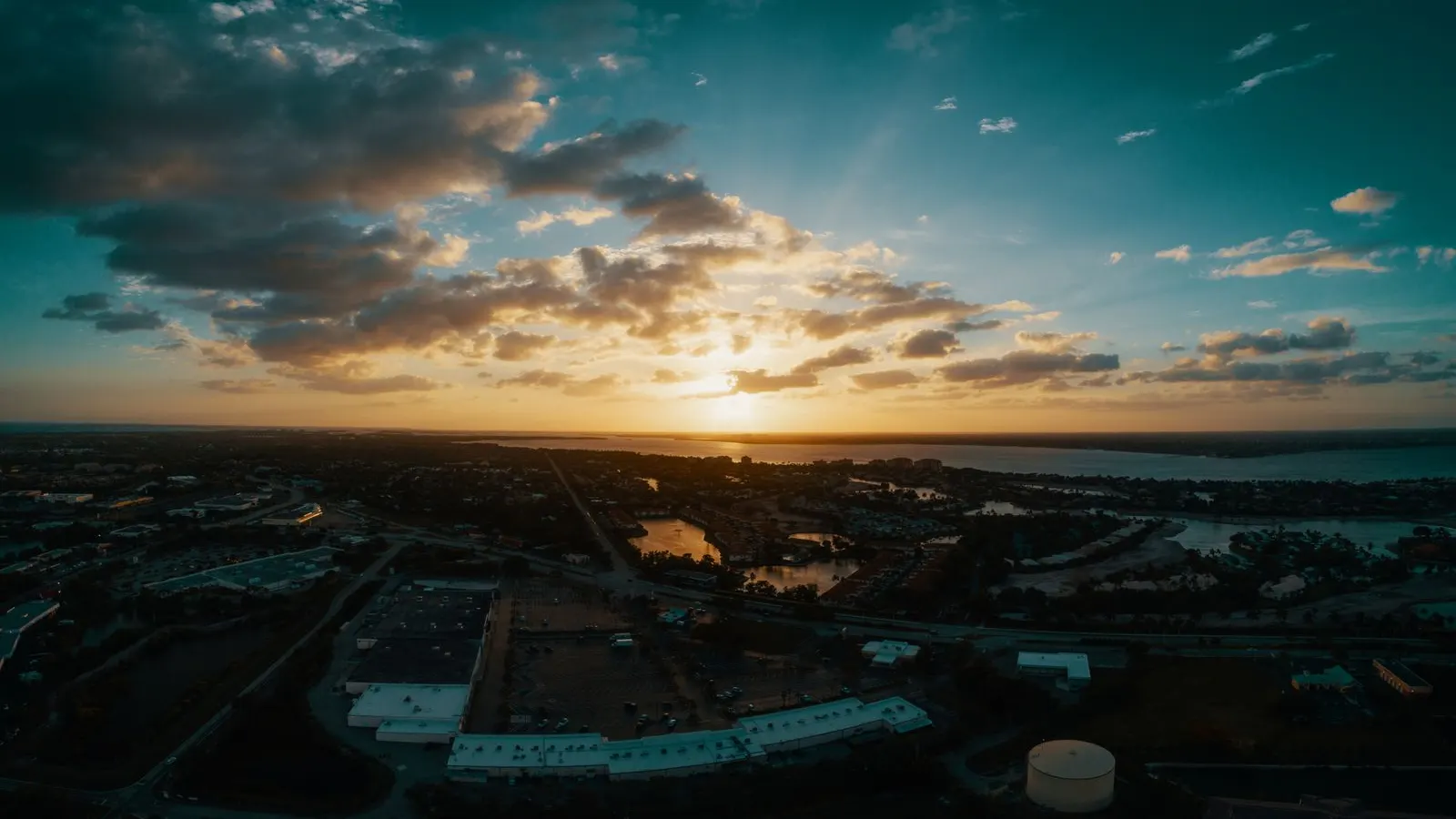 Fort Myers neighborhoods at sunset from above