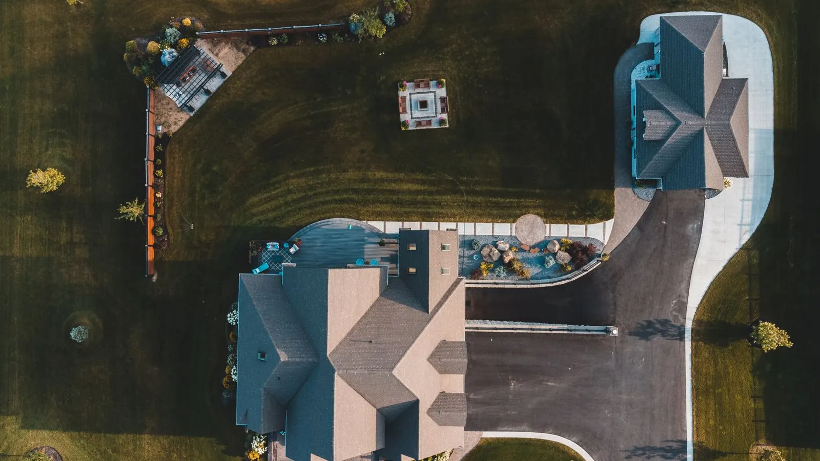 Large home on a wooded lot from above