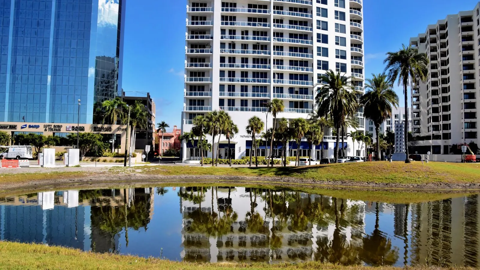 Sarasota towers reflected in a pond