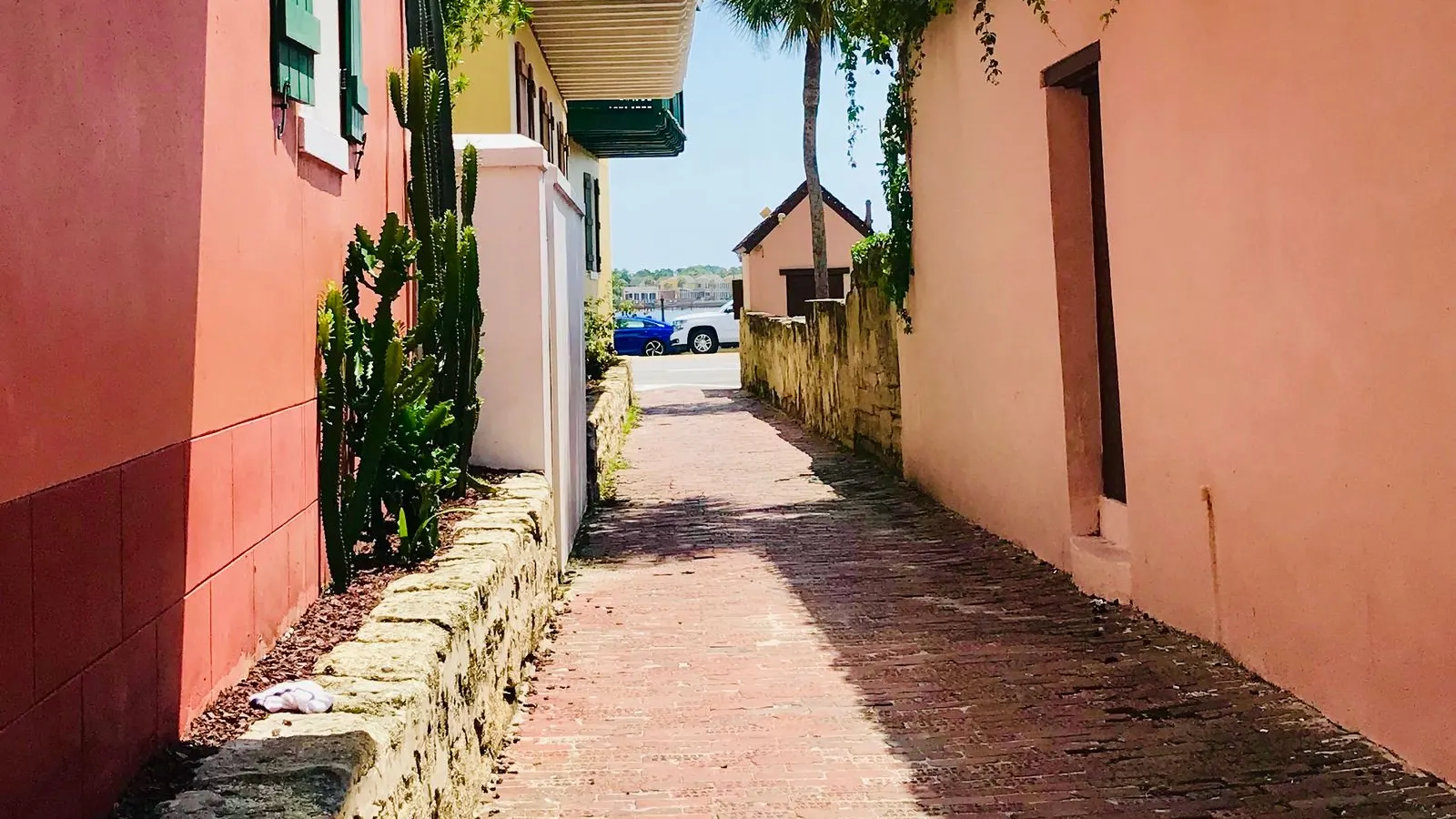 Narrow brick alley between old houses in St. Augustine