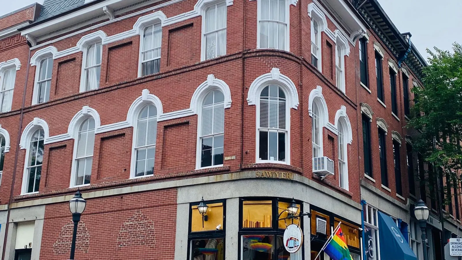 Historic brick building on a street corner in Portland, Maine
