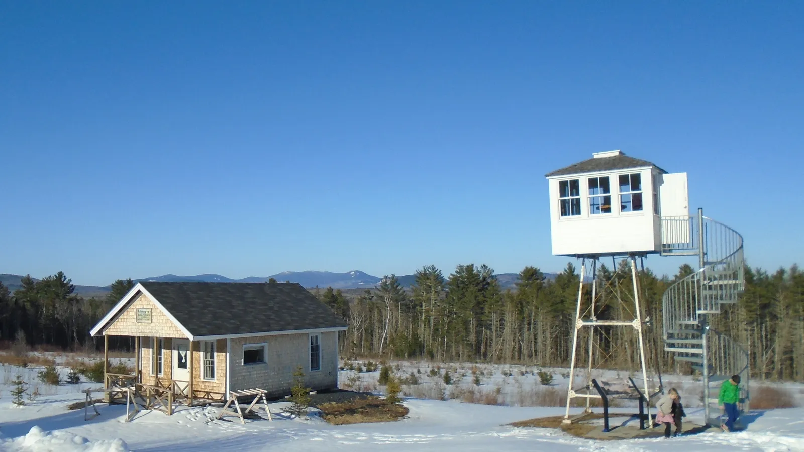 Big Moose Mountain fire lookout tower and warden cabin at the visitor center in Greenville, Maine